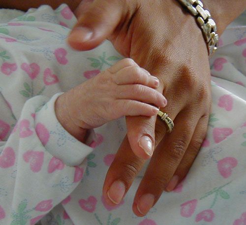 Genevieve and Mommy's hands